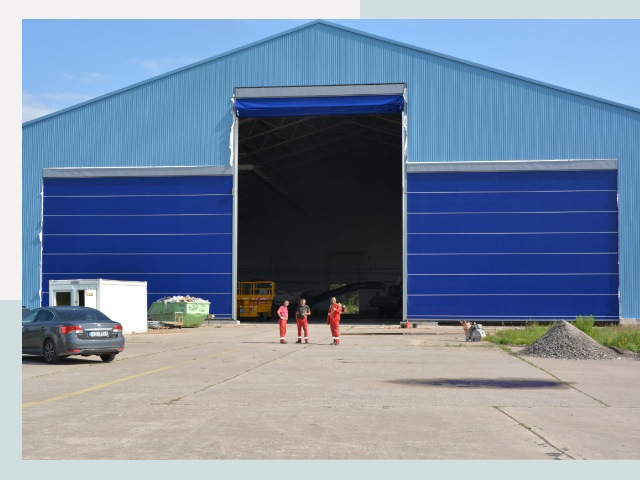 Ангарные ворота в Каменск-Уральский от СтальСтрой-Кмн по цене 638 руб.